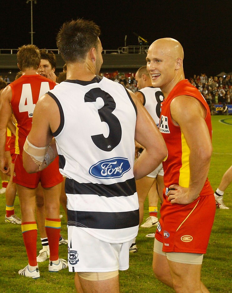 AFL 2011 Rd 10 - Gold Coast v Geelong Jimmy Bartel and Gary Ablett chat after the Cats had defeated the Suns in 2011 - ${keywords}